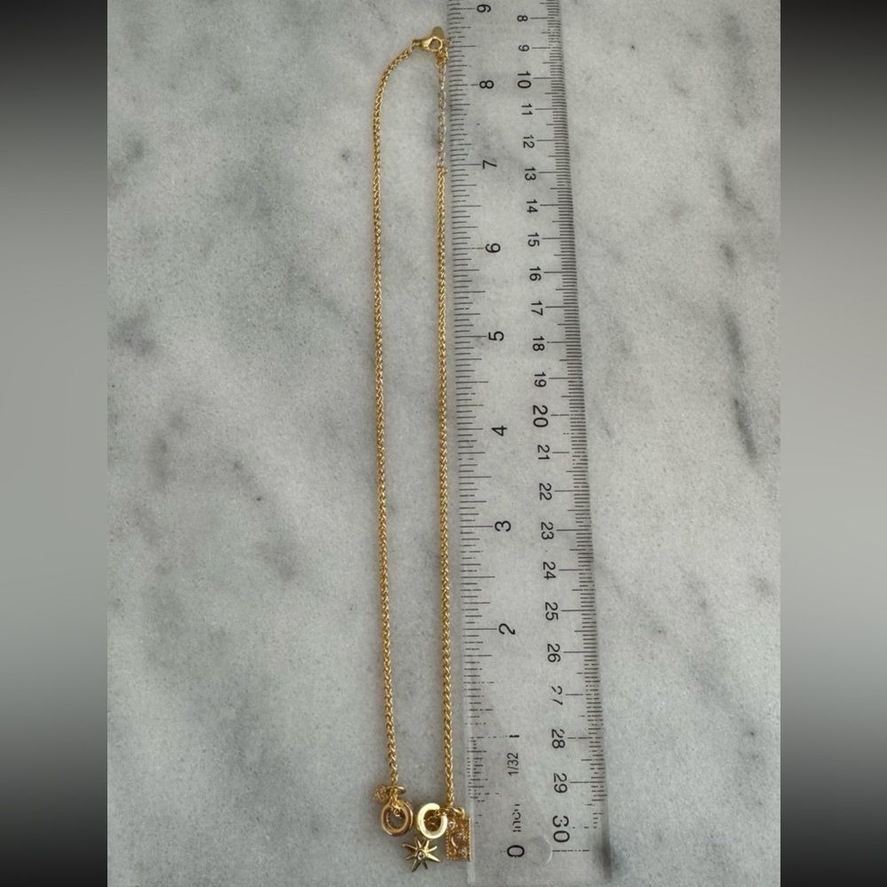 NEW STOCK Gold Star Burst Crystal Moon Charm Necklace 

Brand New - Picture 3 of 5
